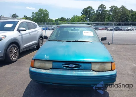 1994 Ford Escort Lx/Sport z USA, uszkodzony, nr VIN 1FARP11J7RW270259